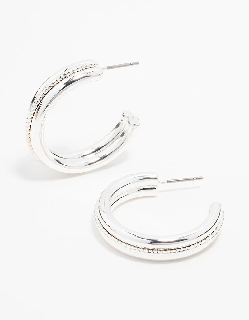 Boucles d’oreilles en cerceau en argent torsadé au centre