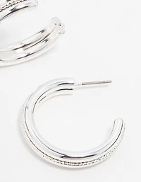 Boucles d’oreilles en cerceau en argent torsadé au centre
