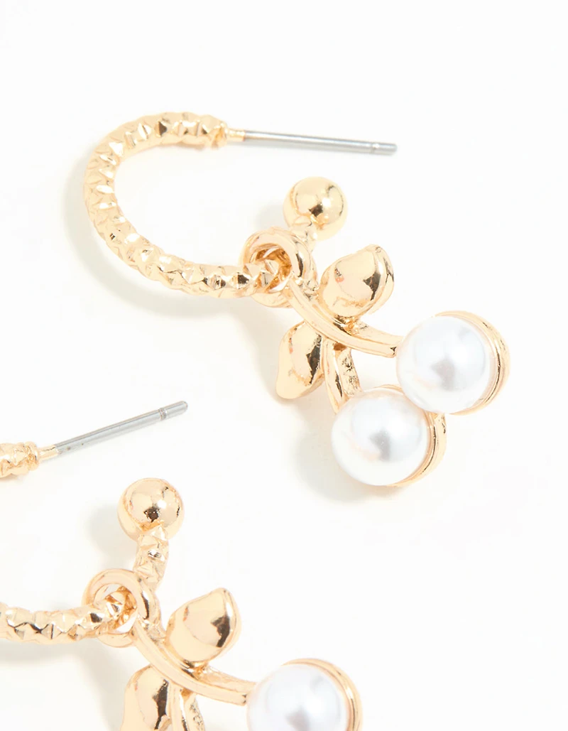 Boucles d’oreilles Huggie en or perle cerise