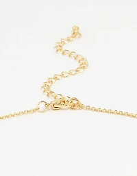 Collier pendentif en croix de nacre plaqué or