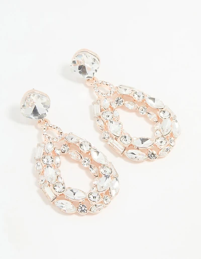 Boucles d’oreilles pendantes ovales en or rose en diamant creux