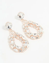 Boucles d’oreilles pendantes ovales en or rose en diamant creux