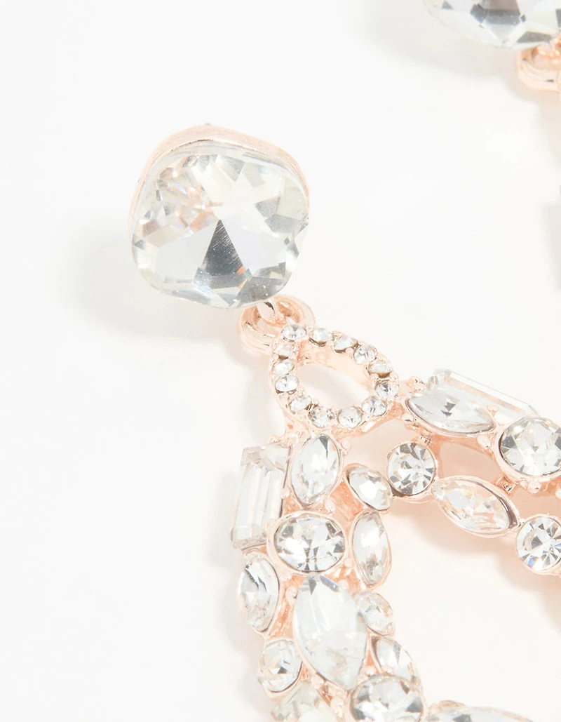Boucles d’oreilles pendantes ovales en or rose en diamant creux