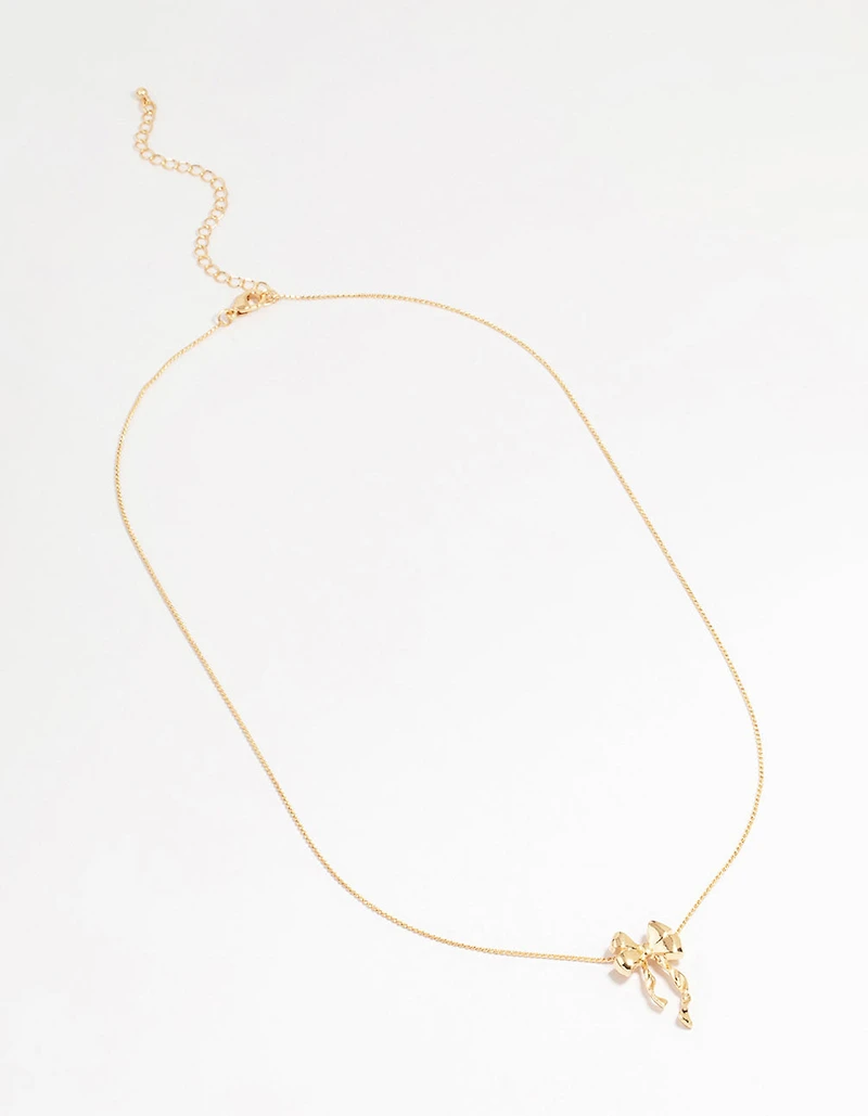 Gold Bow Twirl Pendant Necklace