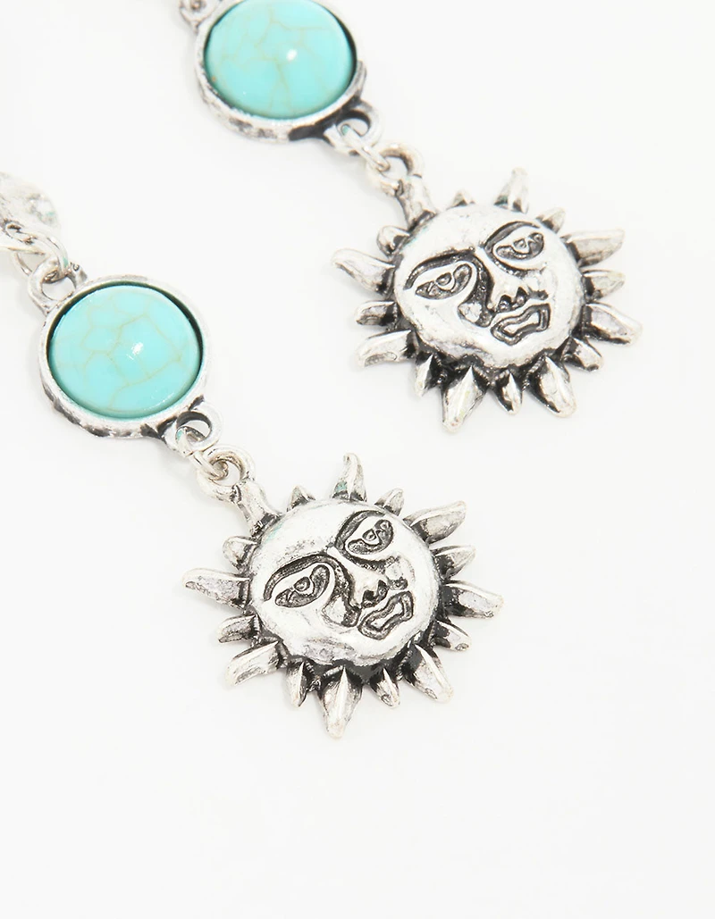 Boucles d’oreilles anciennes en pierre turquoise en argent et goutte de soleil