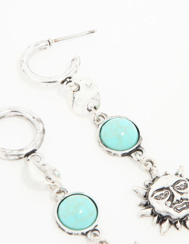 Boucles d’oreilles anciennes en pierre turquoise en argent et goutte de soleil