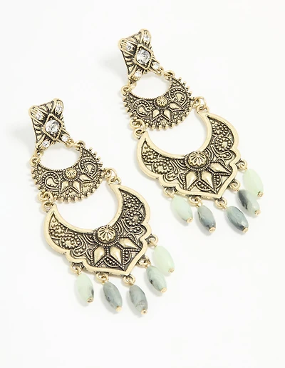 Boucles d’oreilles pendantes anciennes texturées de perles dorées