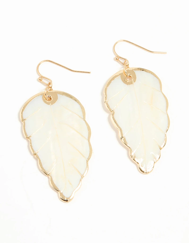 Boucles d’oreilles tombantes en feuille de coquillage authentique en or