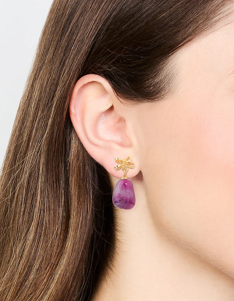 Boucles d’oreilles en pierre pourpre dorée et nœud