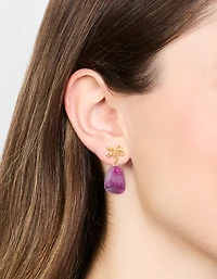 Boucles d’oreilles en pierre pourpre dorée et nœud