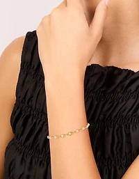 Bracelet à bascule torsadé en perles plaquées or