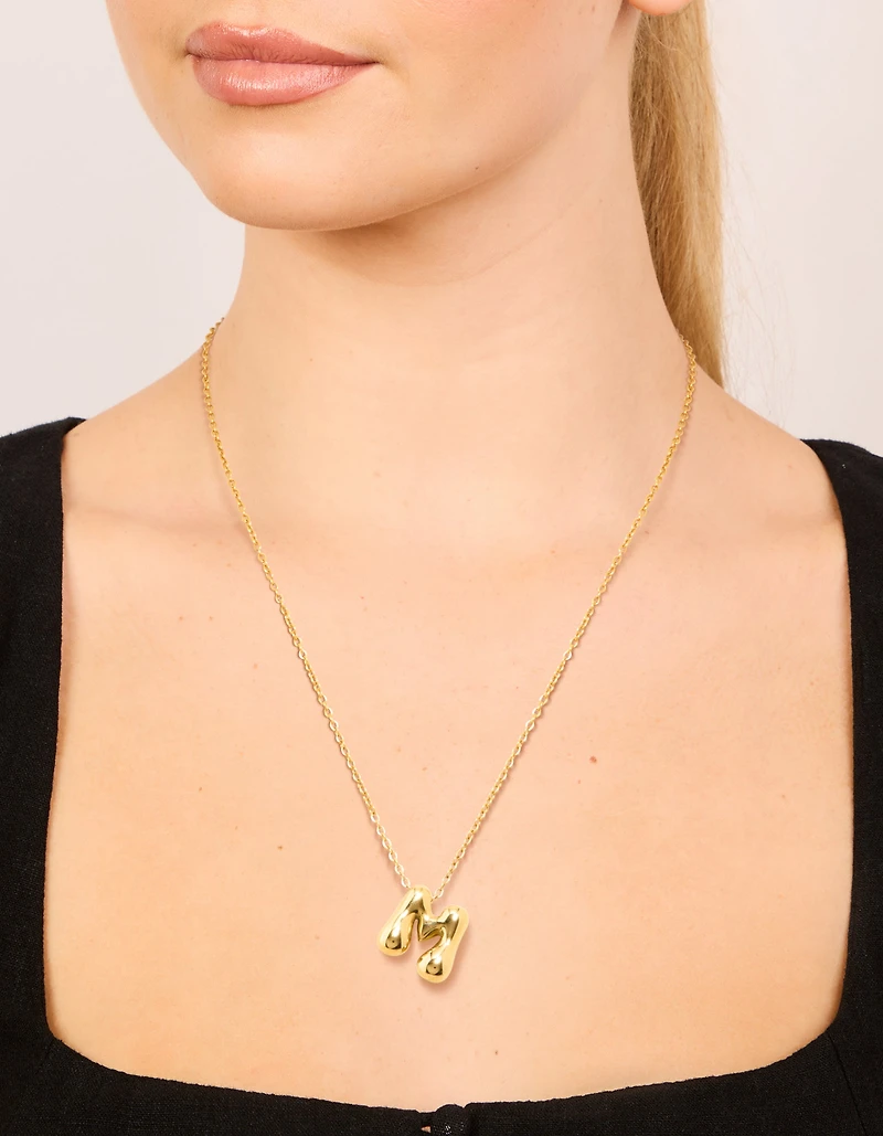 Collier imperméable en acier inoxydable plaqué or avec une grande lettre à bulles M