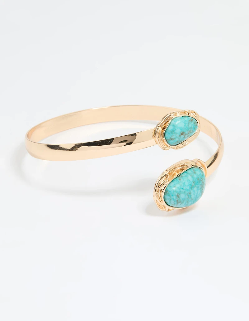Menotte de bras en pierre turquoise dorée