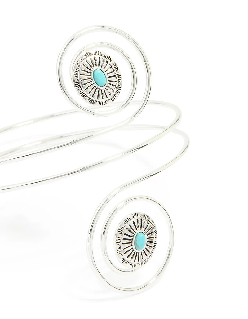 Menotte de bras tourbillonnante en pierre bleu argenté