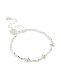 Mini bracelet fleur enroulant plaqué argent