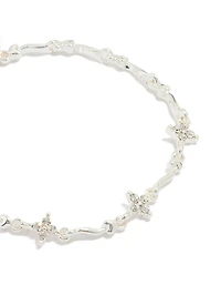 Mini bracelet fleur enroulant plaqué argent