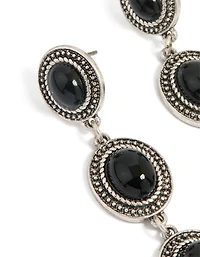 Boucles d’oreilles pendantes anciennes en pierre noire argentée texturée