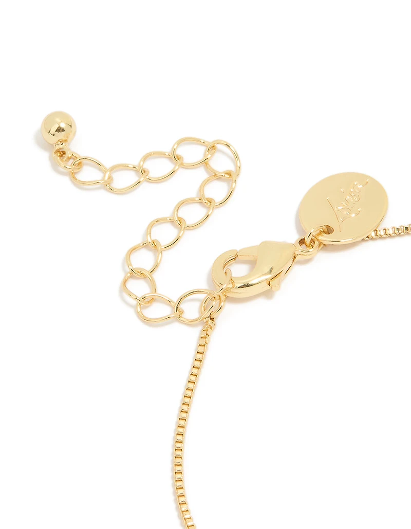Gold Plated Brass Emerald Cross Cubic Zirconia Toggle Bracelet