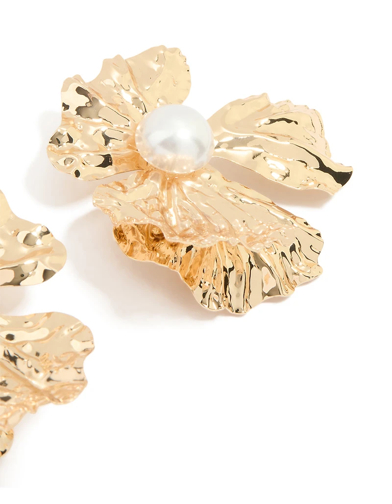 Boucles d’oreilles en fleur fondue au centre de perles en or