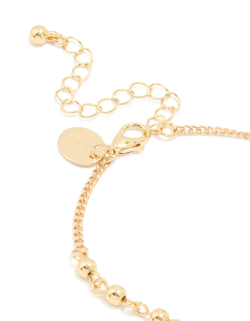 Gold Plated Beaded Cross Lariat Bracelet
