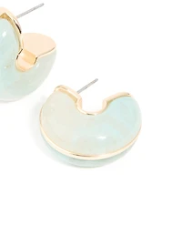 Boucles d’oreilles en résine dorée et verte