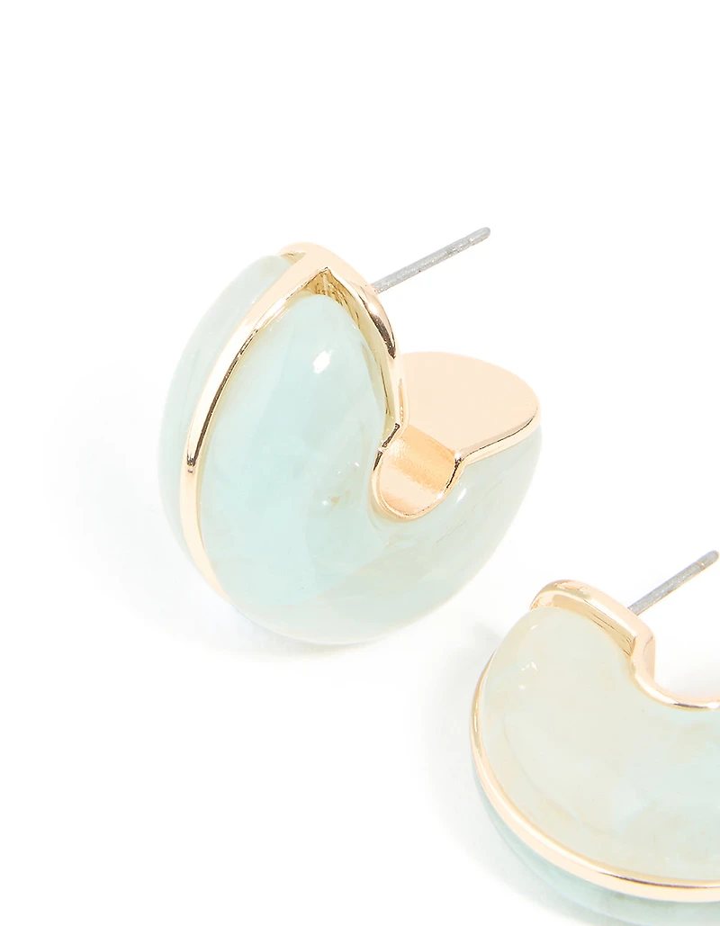 Boucles d’oreilles en résine dorée et verte