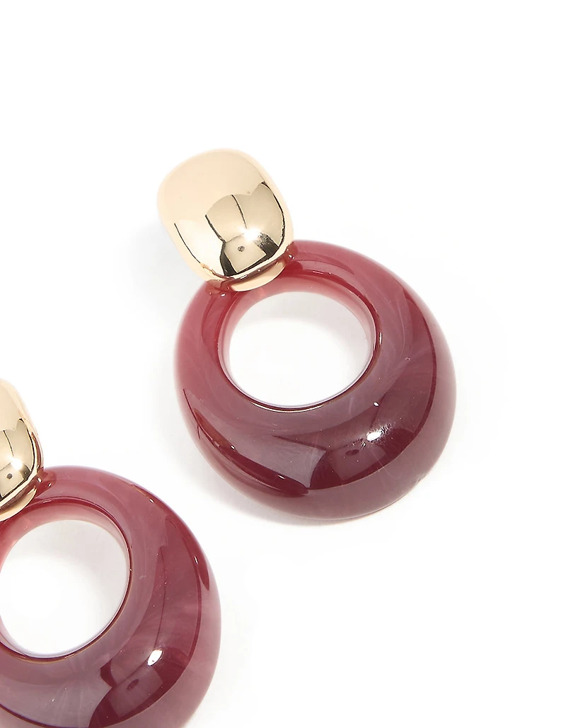 Boucles d’oreilles pendantes ovales en or et bourgogne