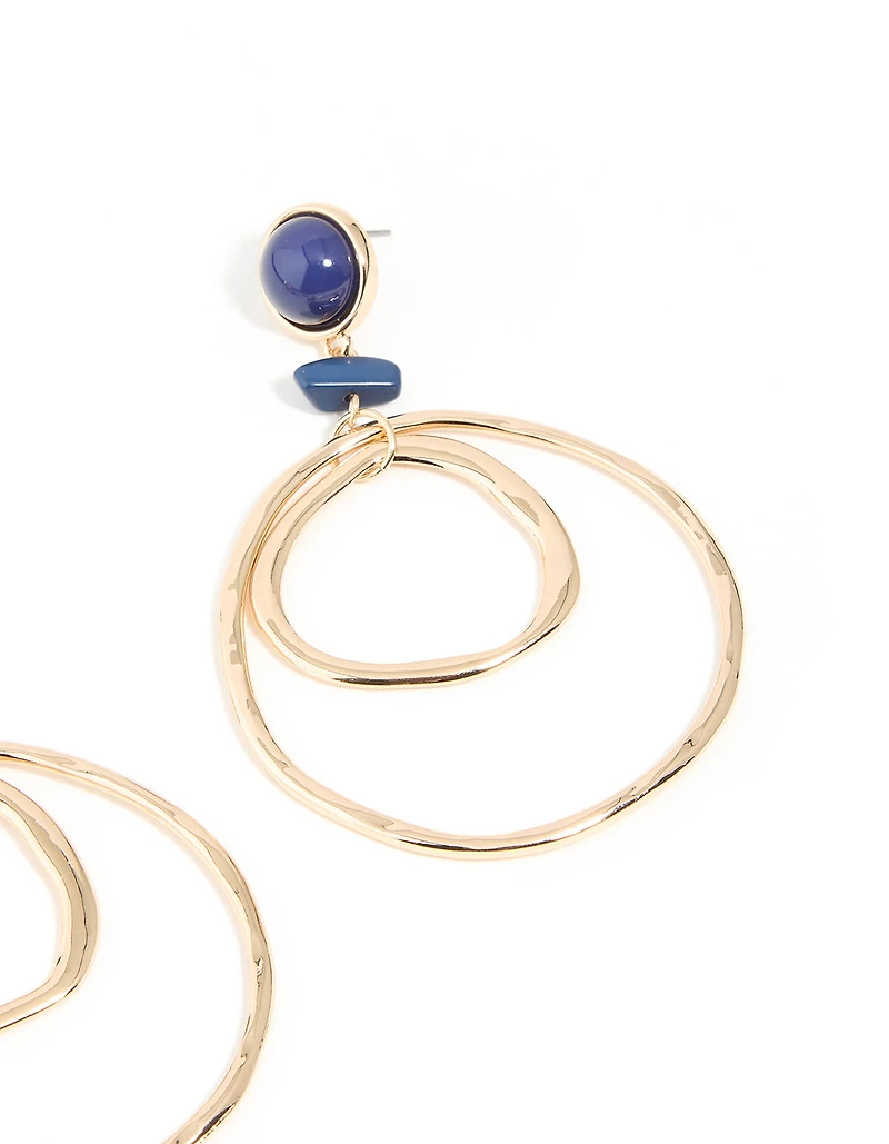 Boucles d’oreilles à double cerceau en pierre bleue dorée