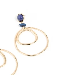 Boucles d’oreilles à double cerceau en pierre bleue dorée