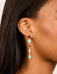 Boucles d’oreilles en triangle aztèque en pierre bleue dorée et diamant rouge