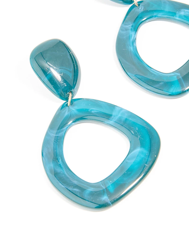 Boucles d’oreilles ouvertes en acrylique bleu organique ouvert et ovales