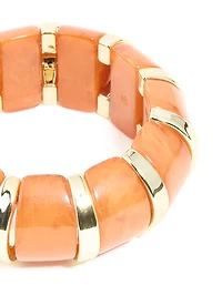 Bracelet extensible en résine dorée et orange
