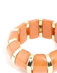 Bracelet extensible en résine dorée et orange