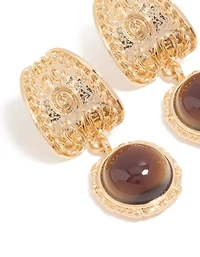 Boucles d’oreilles tombantes à texture dorée brun