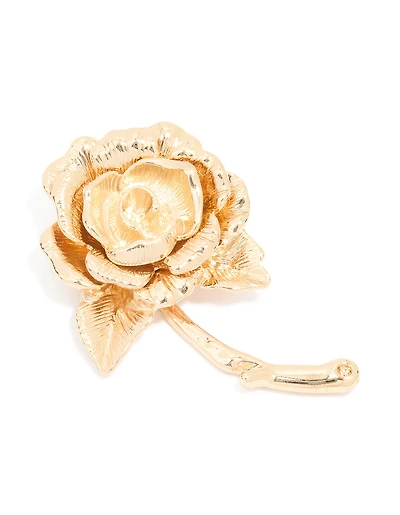 Broche en rose dorée qui fleurit