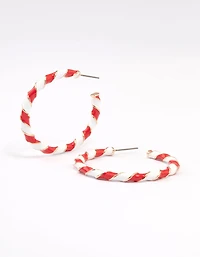 Boucles d’oreilles en forme de canne de bonbon en émail rouge et blanc