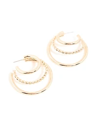 Boucles d’oreilles en or à triple pointe à torsade