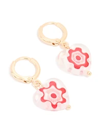Boucles d’oreilles Huggie en forme de cœur peintes en or rose et blanc