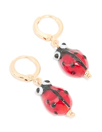 Boucles d’oreilles Ladybug Huggie en or