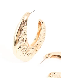 Boucles d’oreilles en forme de grand cerceau à texture dorée en spirale