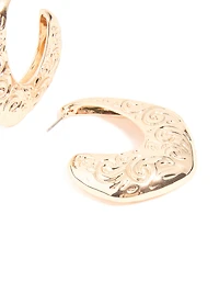 Boucles d’oreilles en forme de grand cerceau à texture dorée en spirale