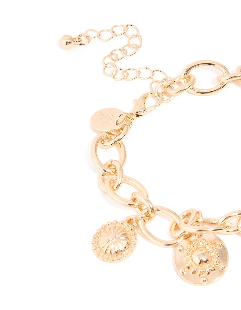 Bracelet breloque croix et cœur en or