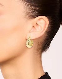 Boucles d’oreilles Huggie Medium en laiton plaqué or