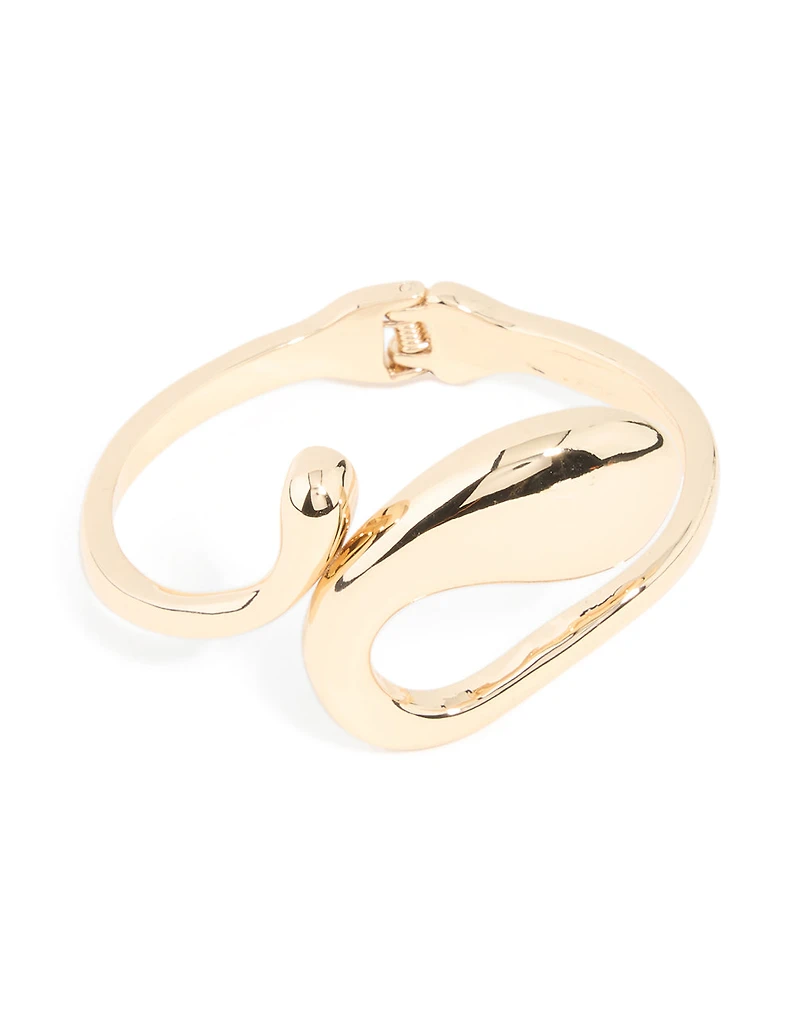 Bracelet à charnière tourbillonnante irrégulière dorée