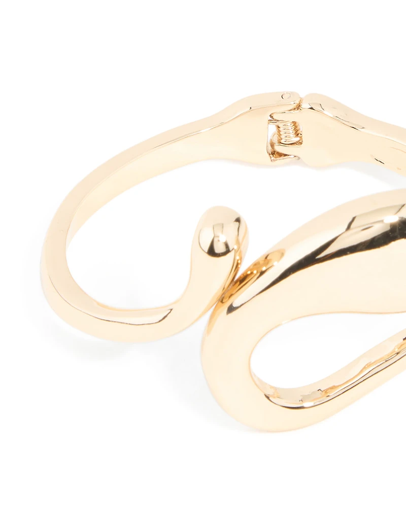 Bracelet à charnière tourbillonnante irrégulière dorée