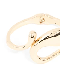 Bracelet à charnière tourbillonnante irrégulière dorée