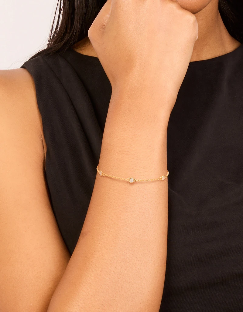 Bracelet de station rond en zircone cubique plaqué or