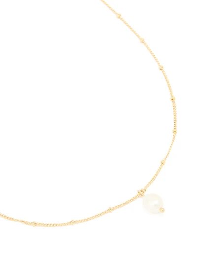 Pendentif en perles d’eau douce plaquées or et collier à boule