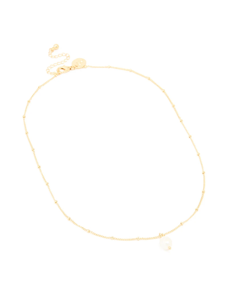 Pendentif en perles d’eau douce plaquées or et collier à boule