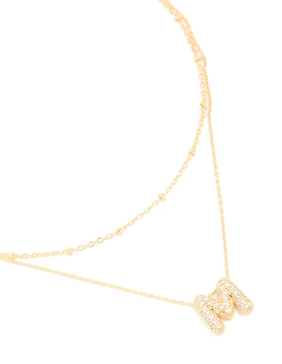 Collier en couches en pavé cubique en zirconie plaqué or avec la lettre M en forme de bulle